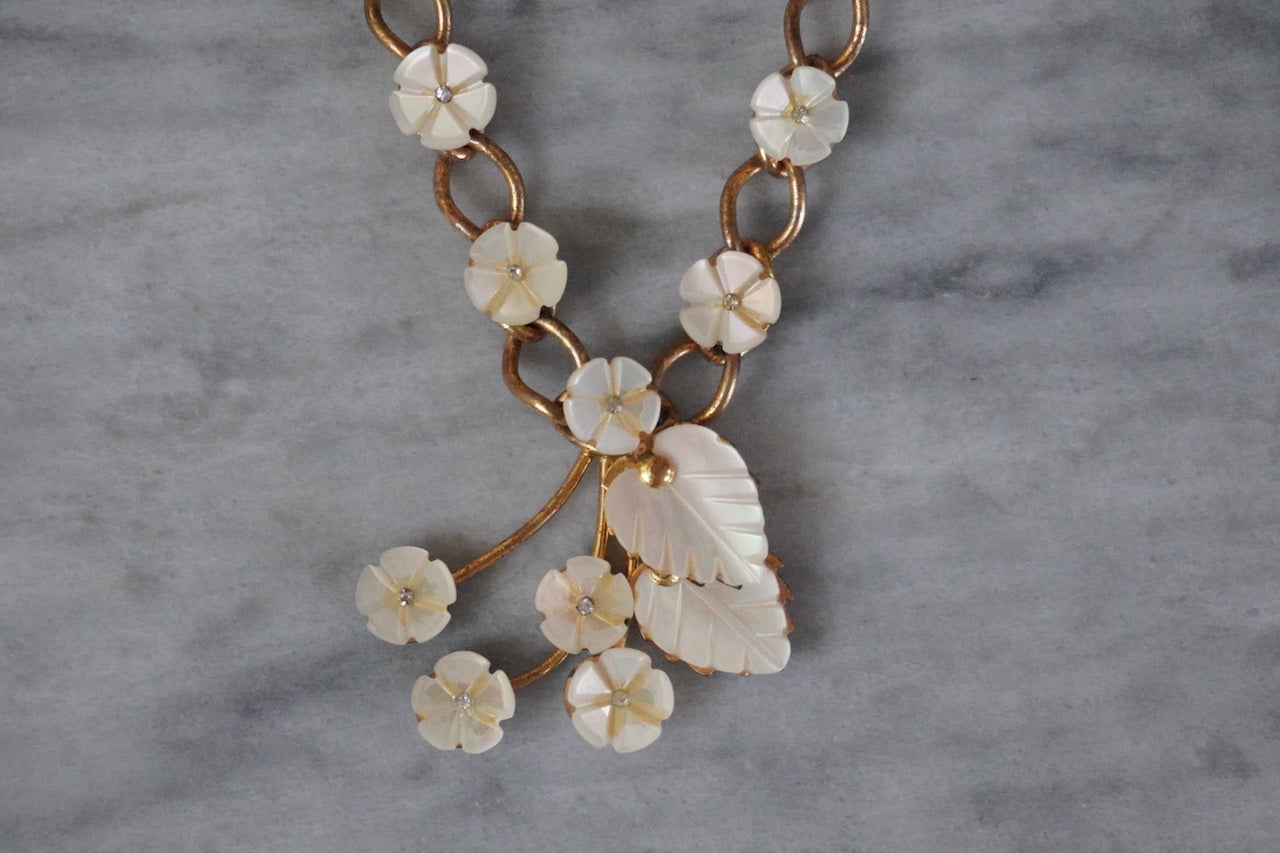 Vintage Art Deco gold tone and mother of pearl flower cascade necklace