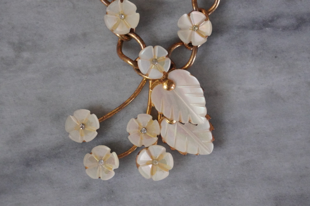 Vintage Art Deco gold tone and mother of pearl flower cascade necklace